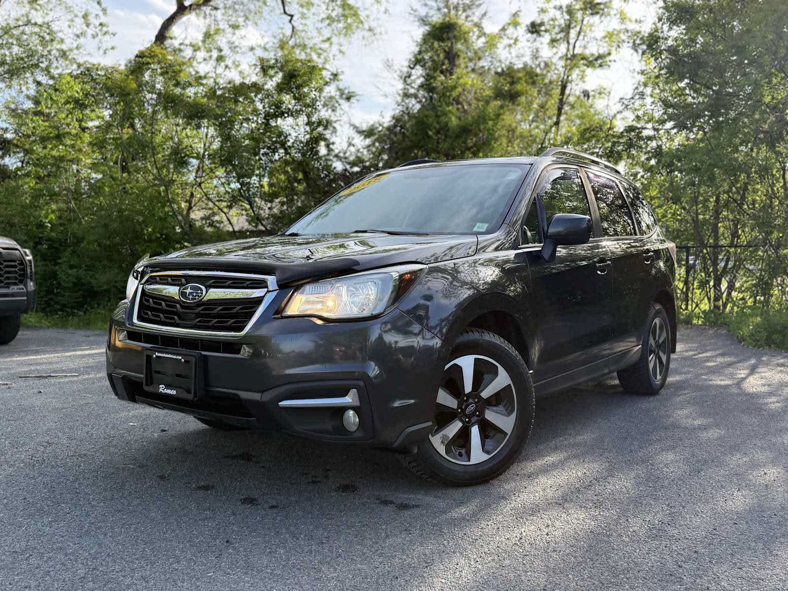 2018 Subaru Forester 2.5i Premium in Dark Gray Metallic — front three-quarter view