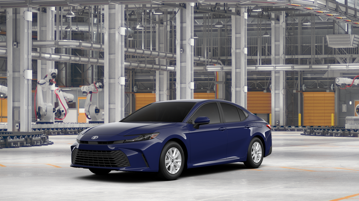 2026 Toyota Camry LE AWD in Reservoir Blue — front three-quarter view